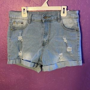 light blue rolled hem ripped denim shorts